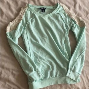 Sea foam green long sleeve top.